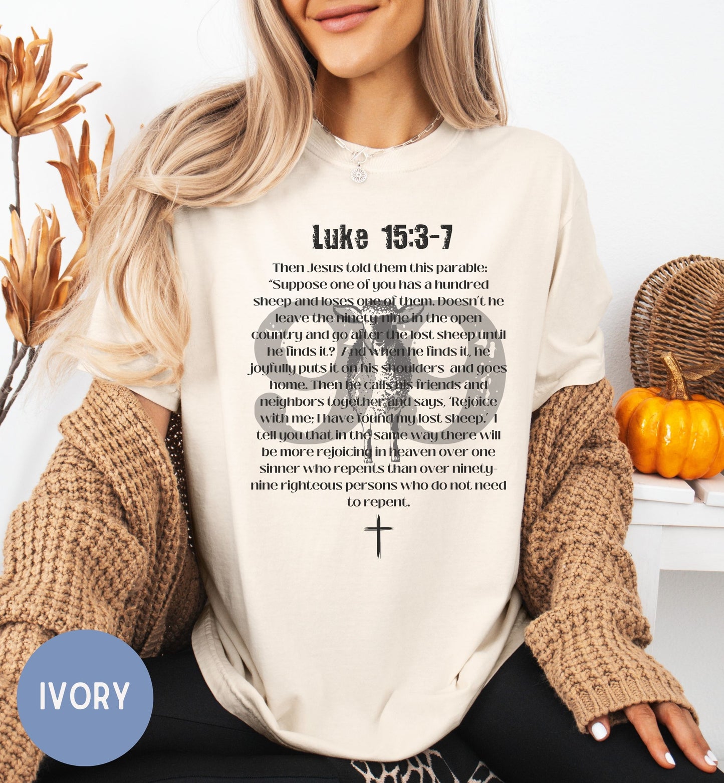 a woman wearing a t - shirt with a bible verse on it