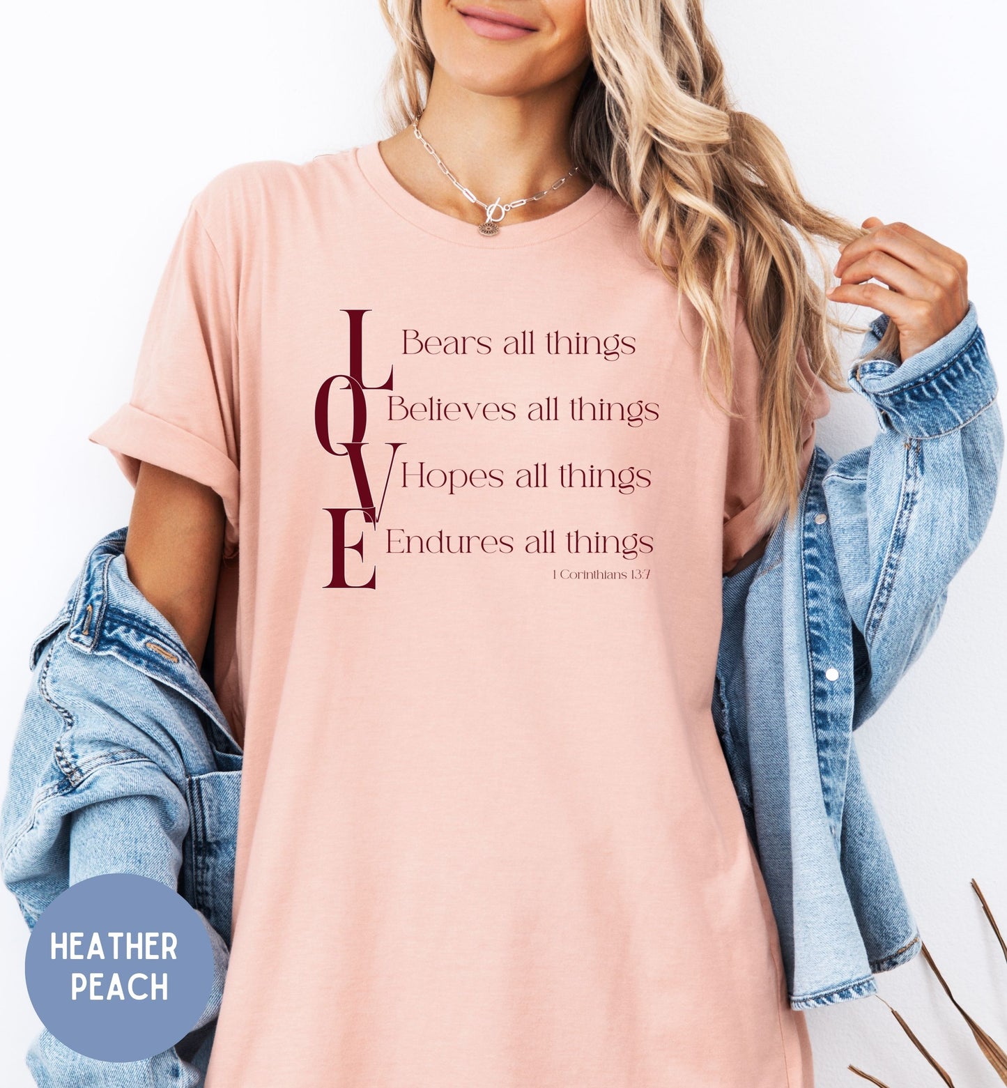 a woman wearing a pink t - shirt with a quote on it