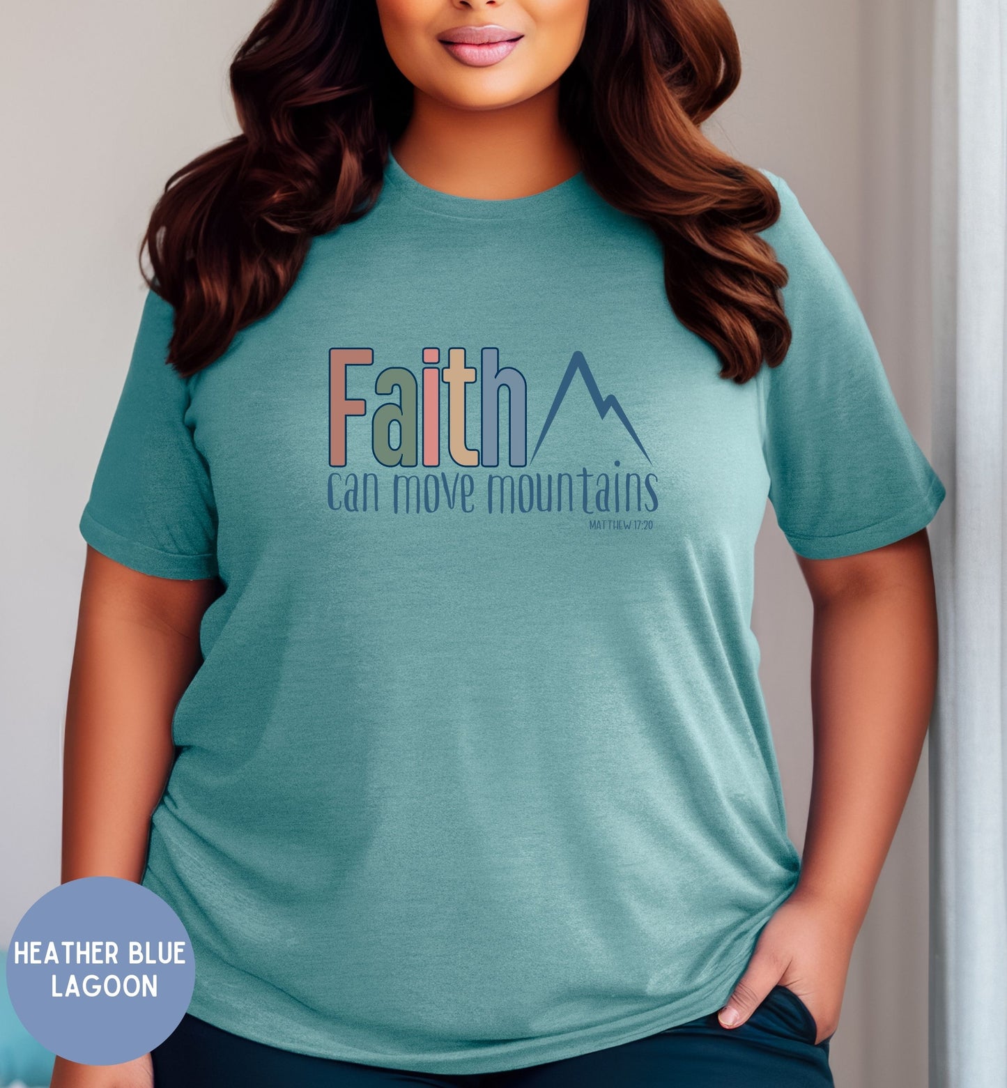 a woman wearing a t - shirt that says faith can move mountains