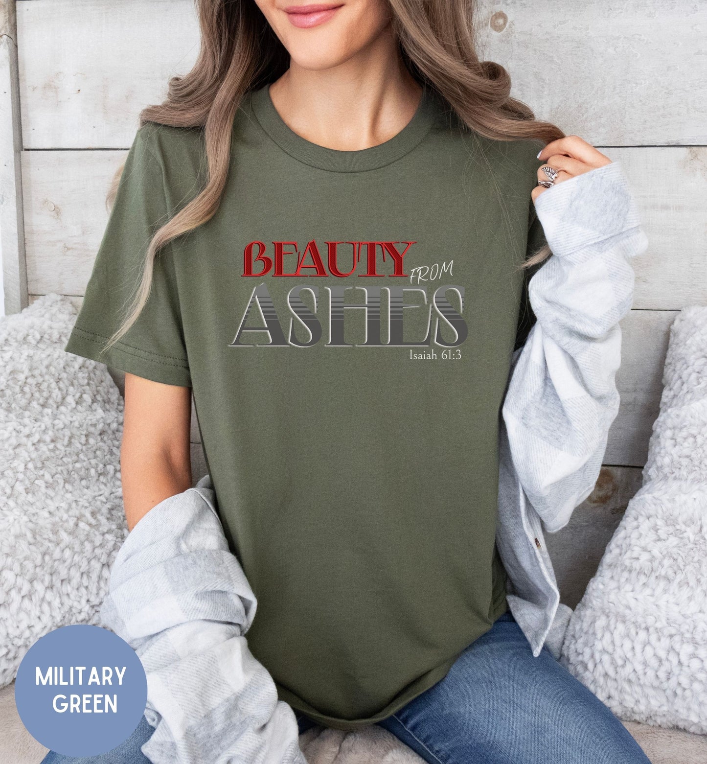 a woman wearing a t - shirt that says beauty from ashes