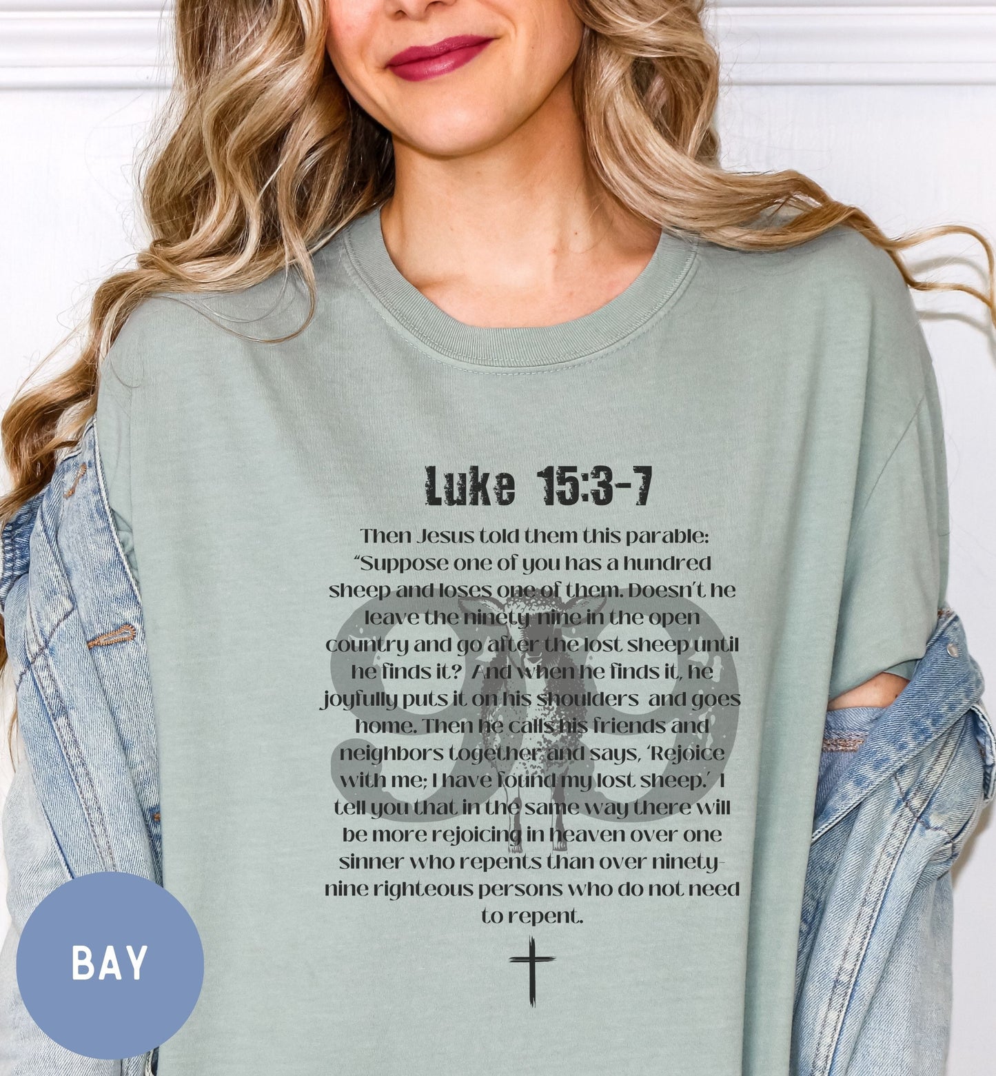 a woman wearing a t - shirt with the words luke 13 - 7 printed on
