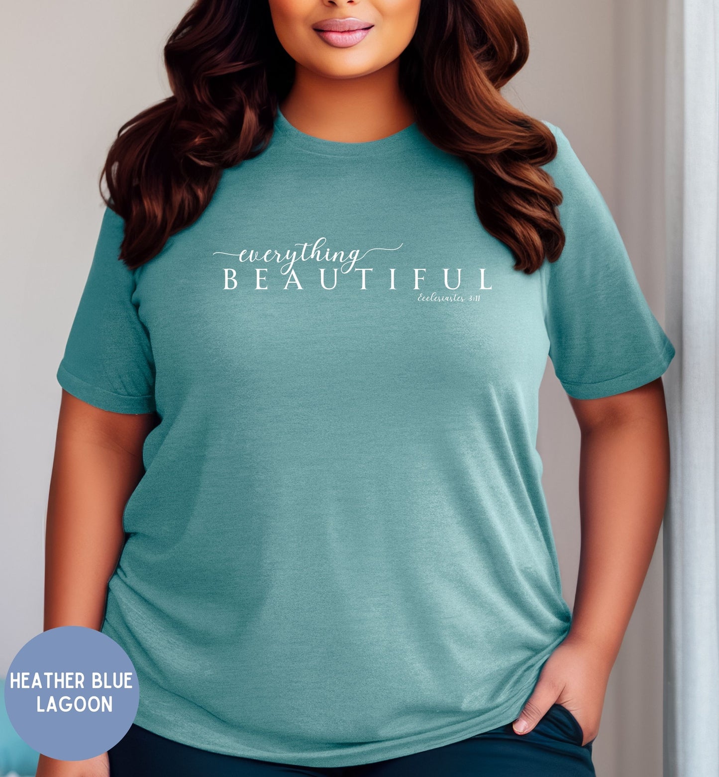 a woman wearing a t - shirt that says everything beautiful